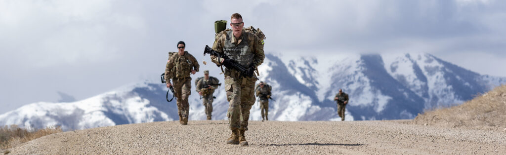 Soldiers endure a six-mile ruck march back to garrison during the Utah National Guard Best Warrior Competition at Camp Williams